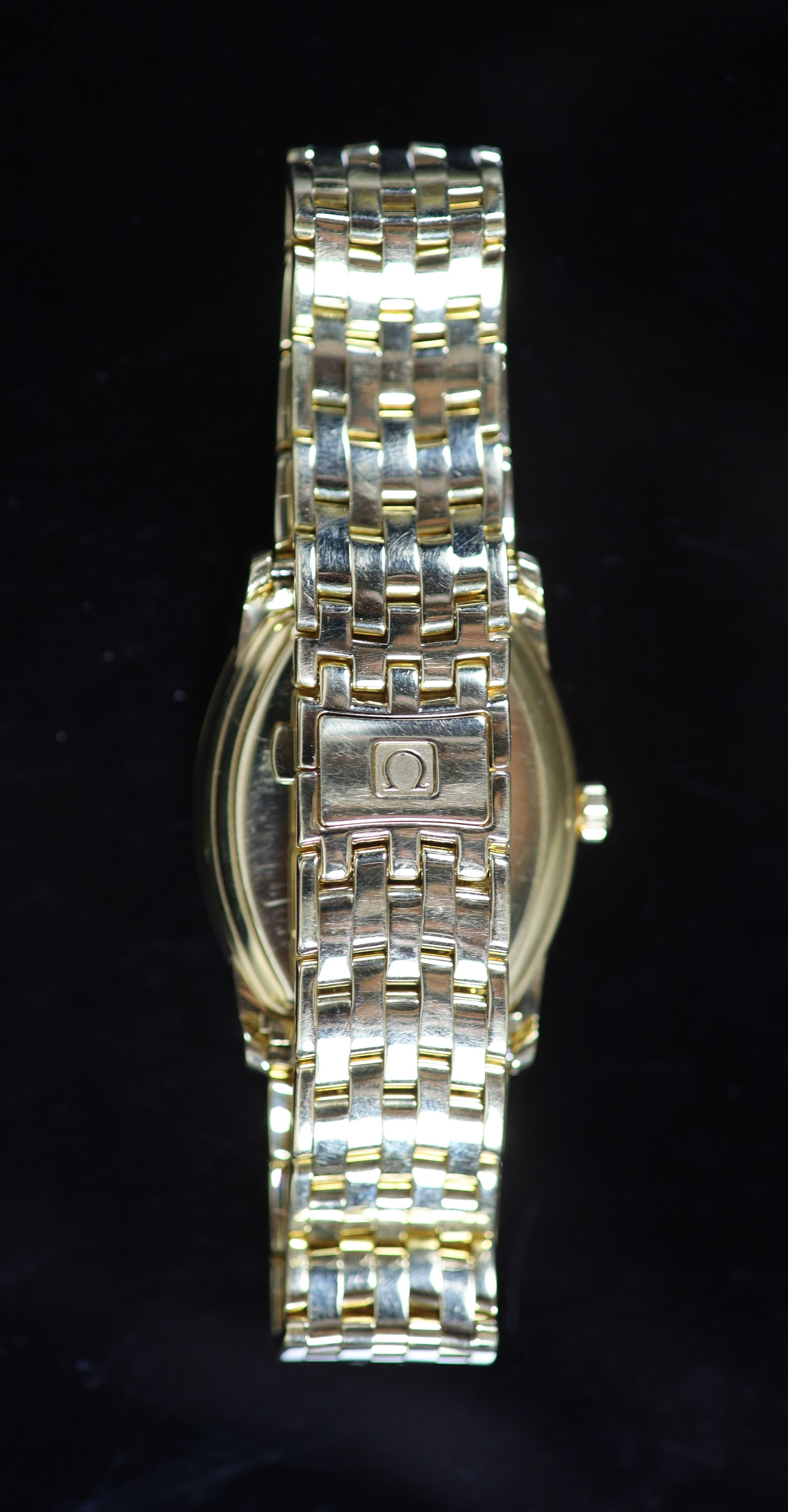 A gentleman's 18ct gold Omega Automatic Chronograph wrist watch, on an 18ct gold Omega bracelet